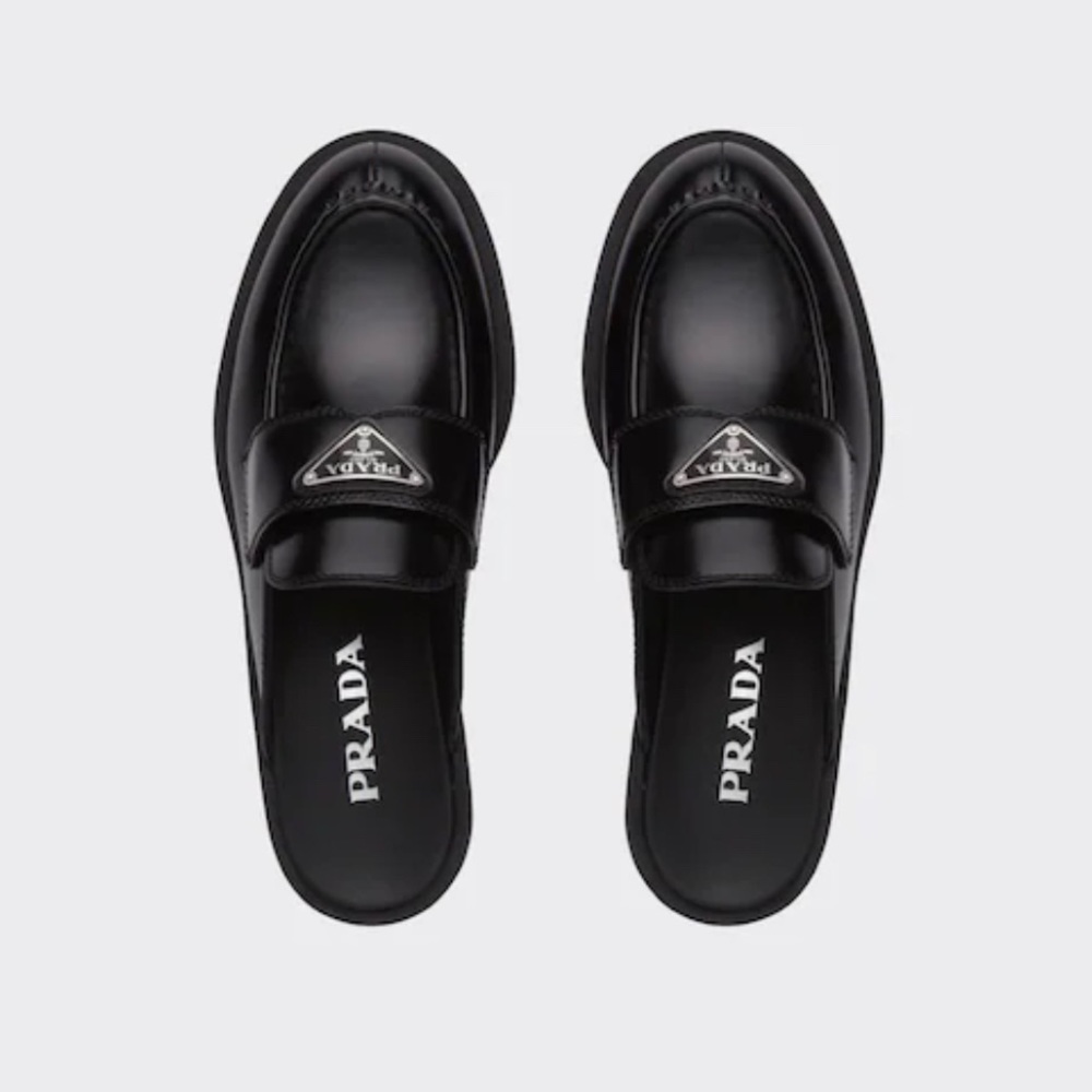 Prada loafers.